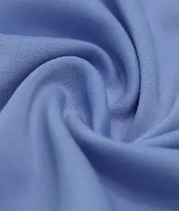 A close up image of a white colour organic cotton knit fabric