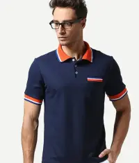 Corporate uniform polo t-shirt with tipped collar, worn by an office employee