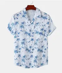 A comfortable Hawaiian Shirt, white in colour with small blue coconut trees printed as a pattern
