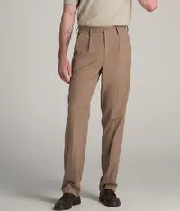 A photo showing a man wearing a crisp pair of brown trousers