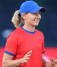 A woman wearing a blue colour cap